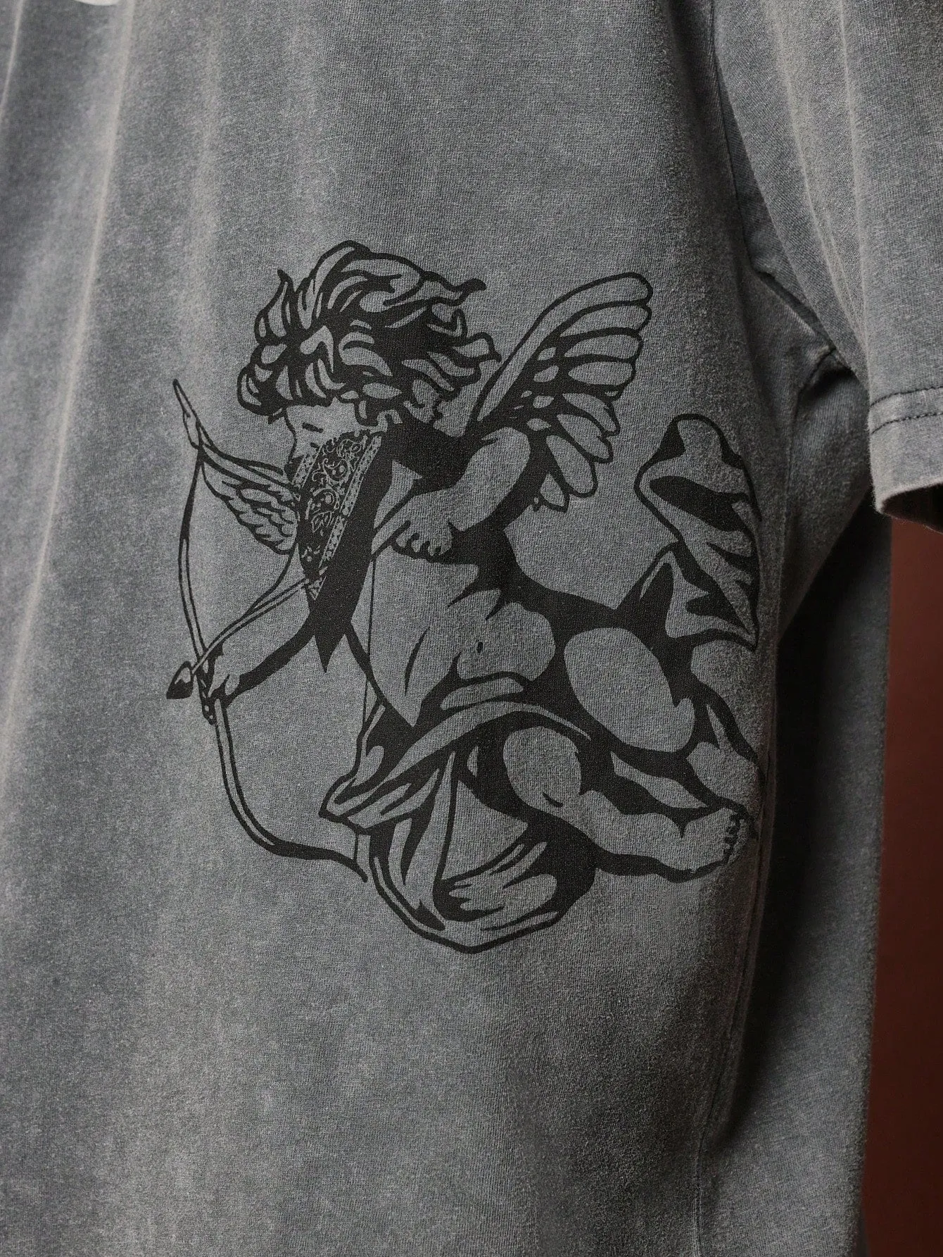Oversized Fit Short Sleeve Washed Tee With Cherub Graphic Print